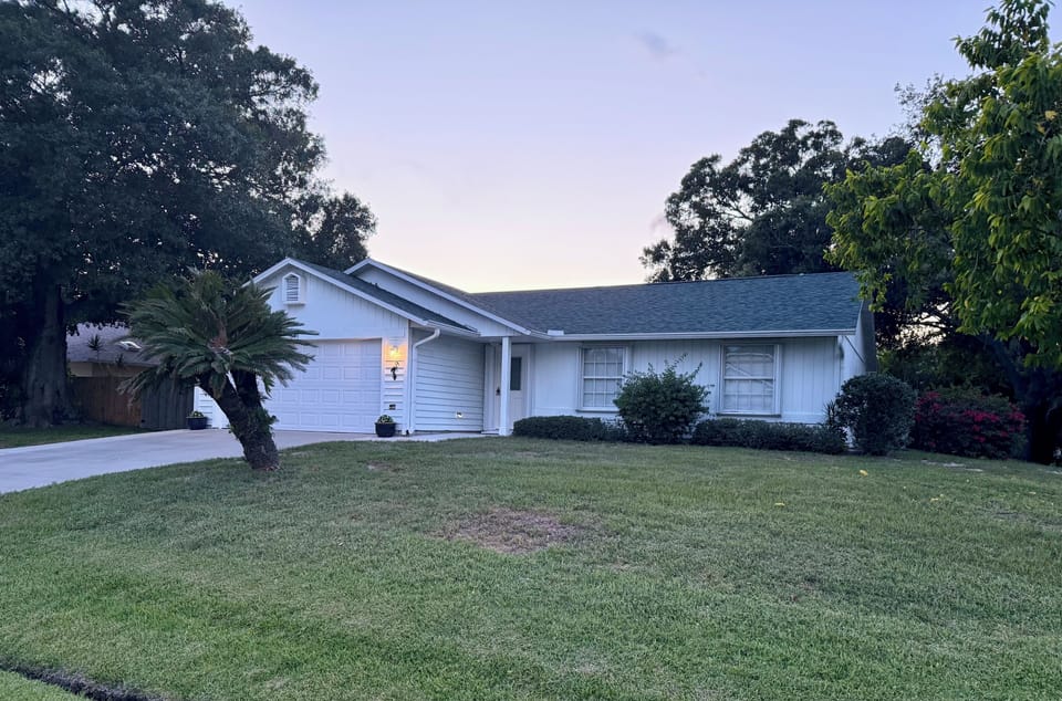 Oversized corner lot in a quaint family neighborhood.  Private back yard. 