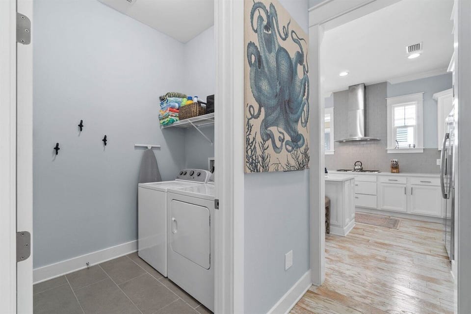 A practical and well-organized laundry area with modern appliances.