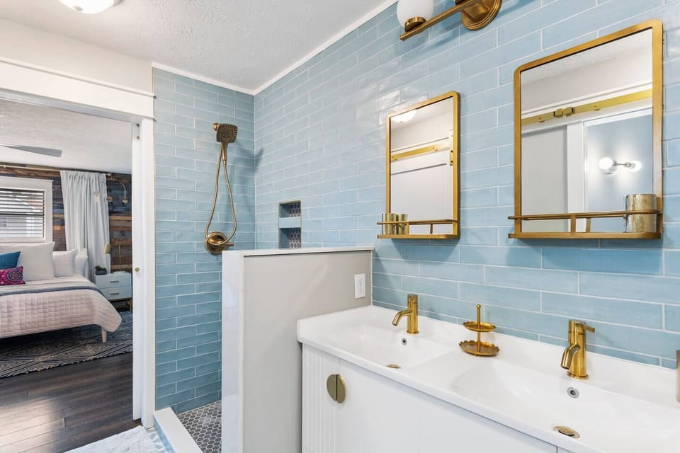 Glass shower doors have been installed.