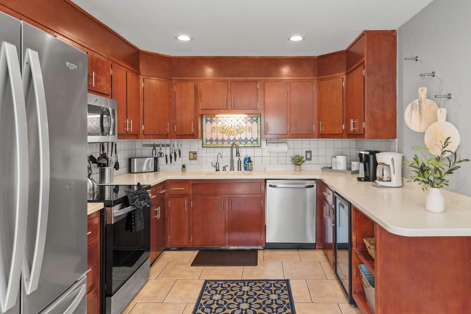 This kitchen is stylish and functional, with plenty of counter space for meal prep.