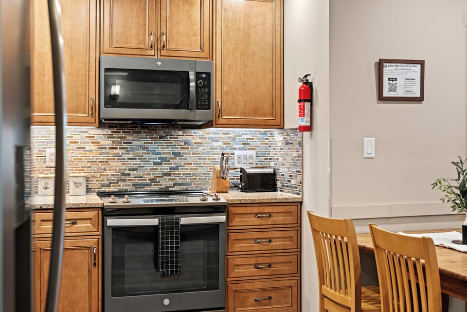 Kitchen next to dining.