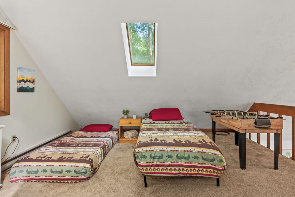 Bedroom fun with a foosball table.