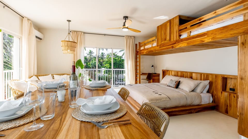 King-size bed with AC, ceiling fan and standing fan. Smart lock entry, hot water, on-site washer and dryer, fully equipped kitchen with microwave and oven. Designed for comfort, convenience and relaxing Caribbean stays.
