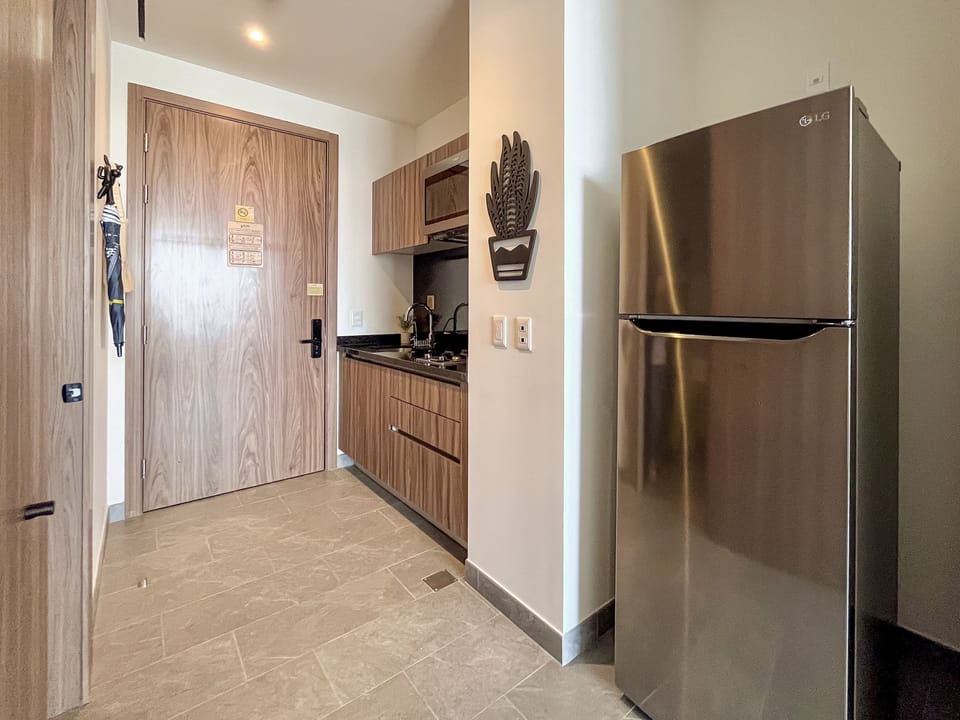 Luxury Loft | Private kitchen | Full-size fridge, microwave, stovetop, espresso maker