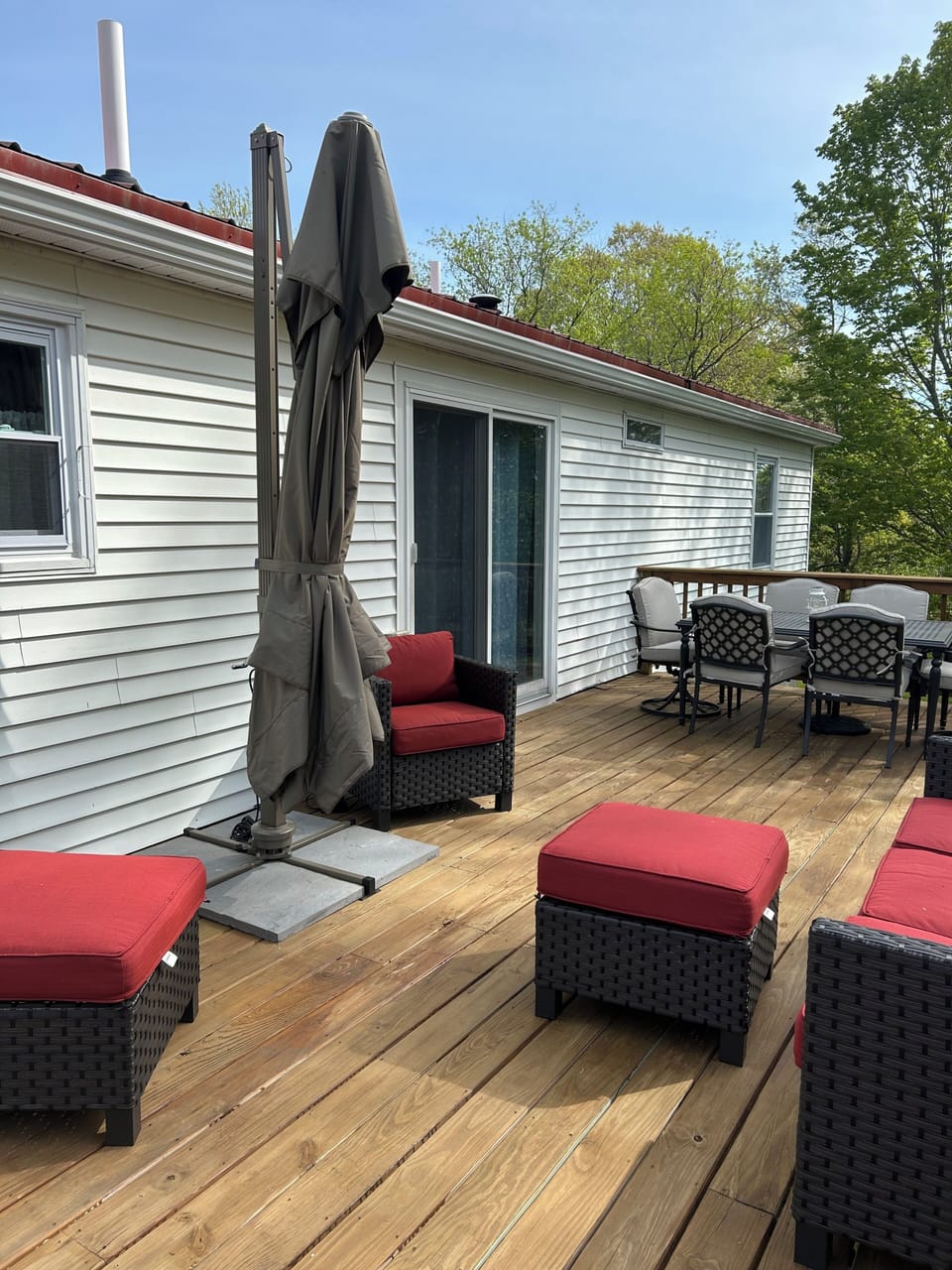 Spacious deck with dining space and lounge space. 