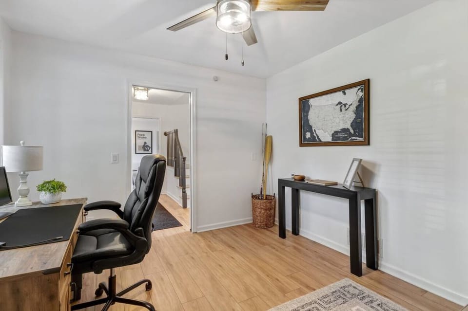 Den with work area and pull out queen bed