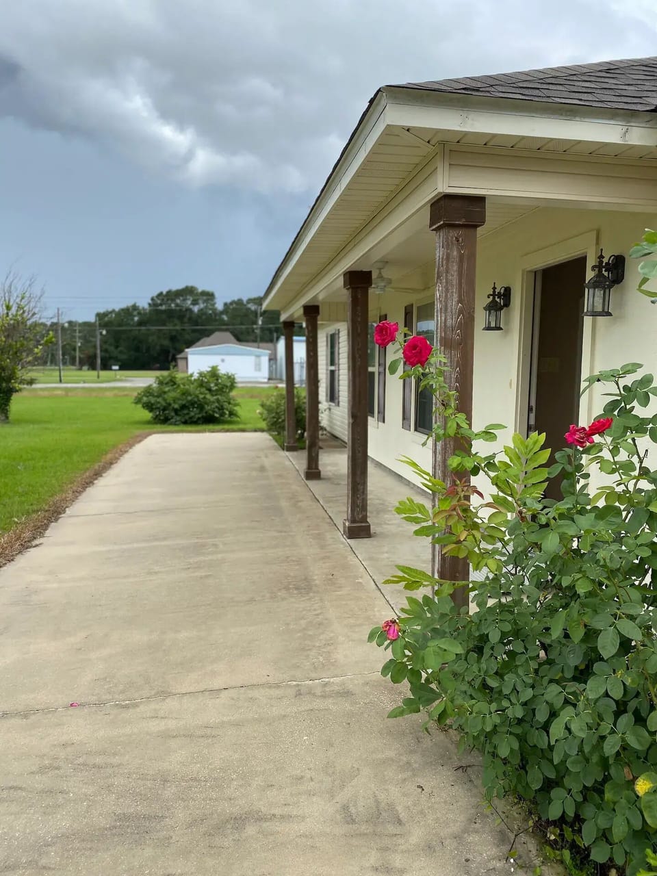 Walkway with porch and sitting area
