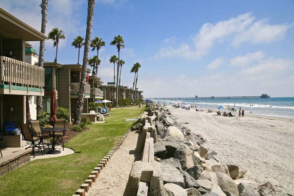 View from oceanfront row. Beach access on sides of complex or walking down the sea wall