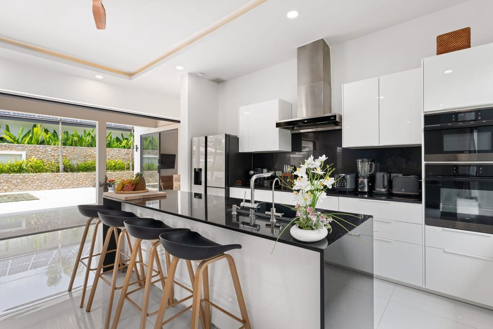 Exclusive Villa | Private kitchen | Full-size fridge, microwave, oven, stovetop