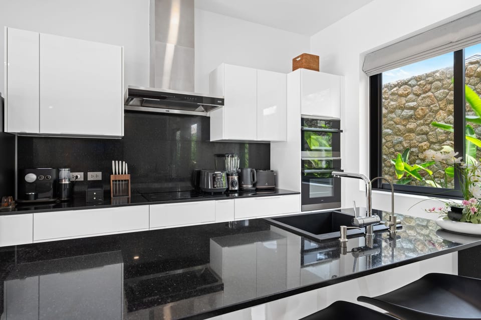 Exclusive Villa | Private kitchen | Full-size fridge, microwave, oven, stovetop
