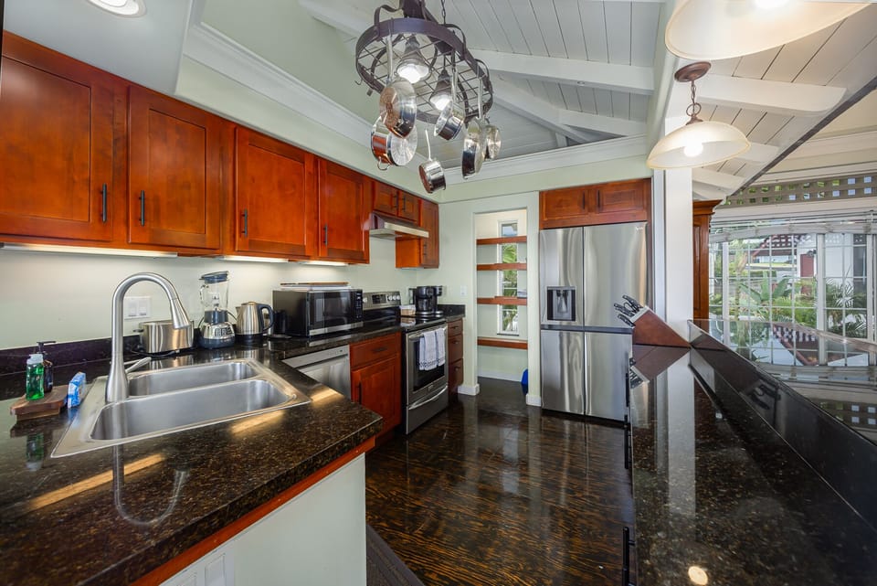 The kitchen is set to prepare a tropical meal amid an island-inspired ambiance.
