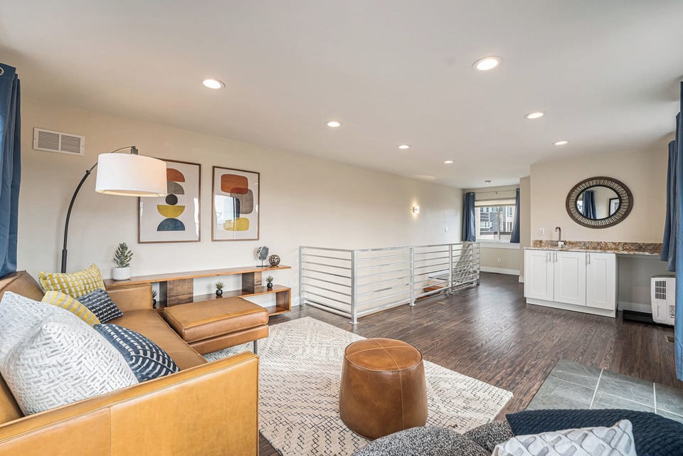 Relax and unwind in our third-floor sitting area, complete with a mini bar for your enjoyment!
