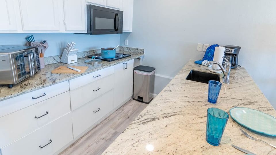 You can dine at the kitchen bar as well