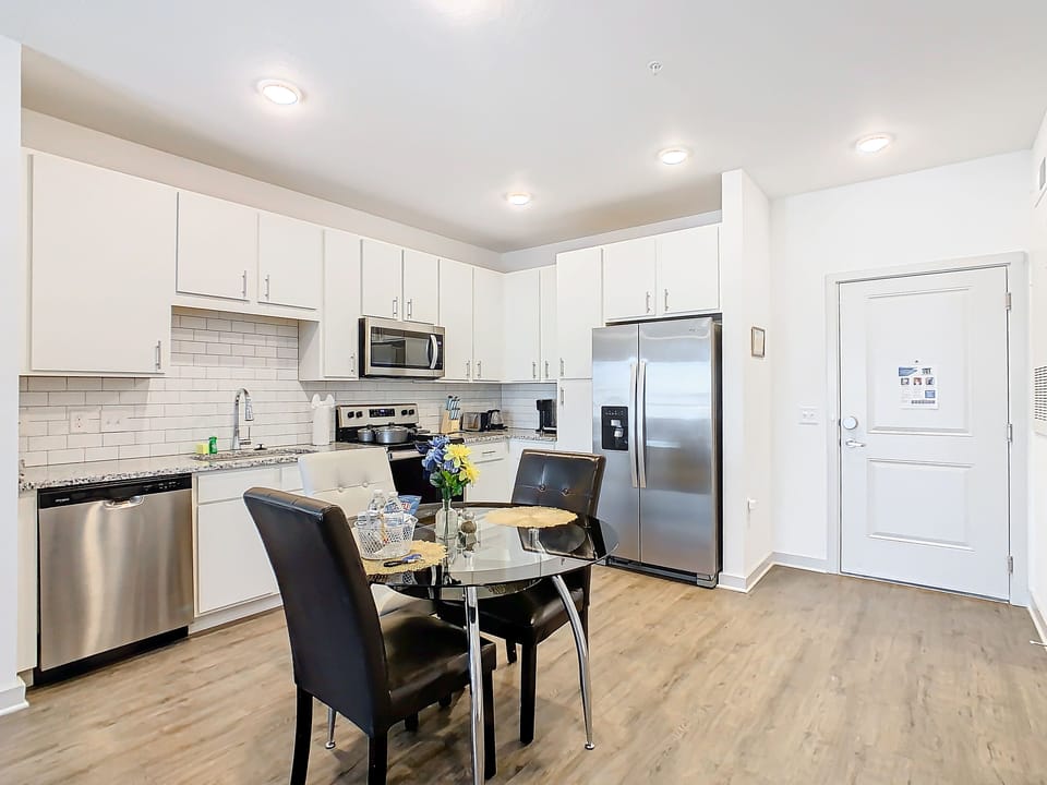 Modern and sleek kitchen, perfect for culinary adventures, during your stay.