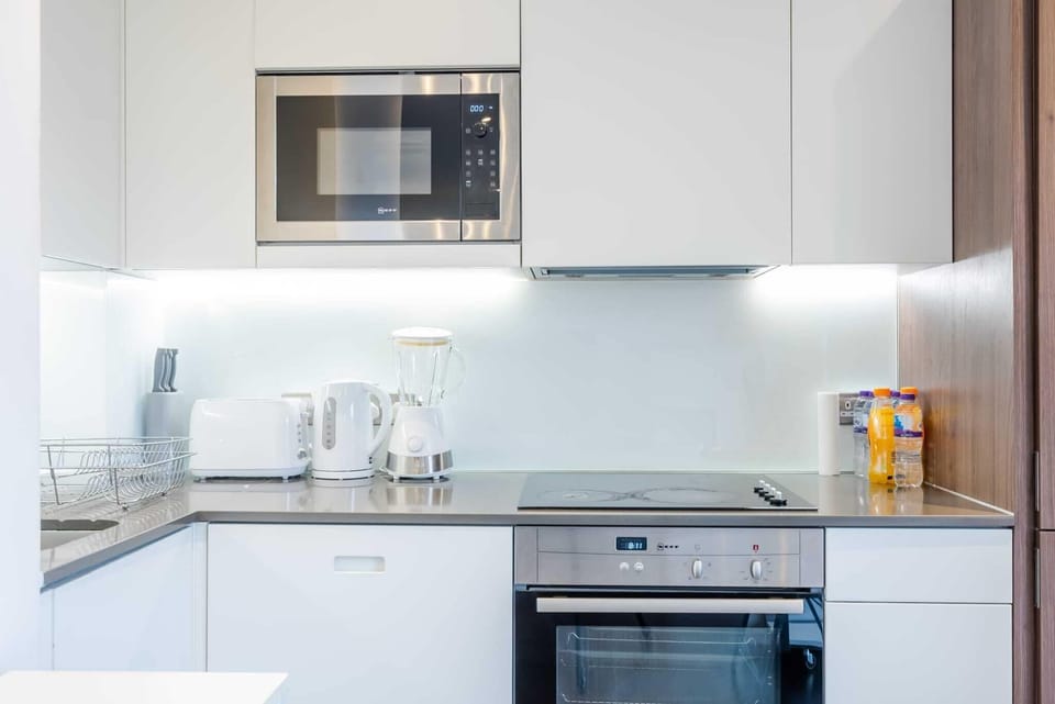 Apartment | Private kitchen | Fridge, microwave, oven, stovetop