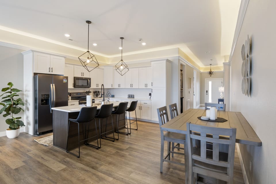 The spacious kitchen and dining area creates a perfect connecting place for meals and game nights