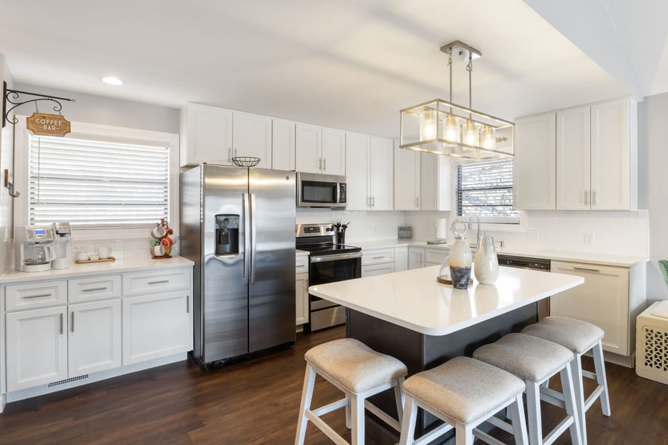 The open kitchen allows for everyone to be a part of the favorite time of day - meals at the lake!
