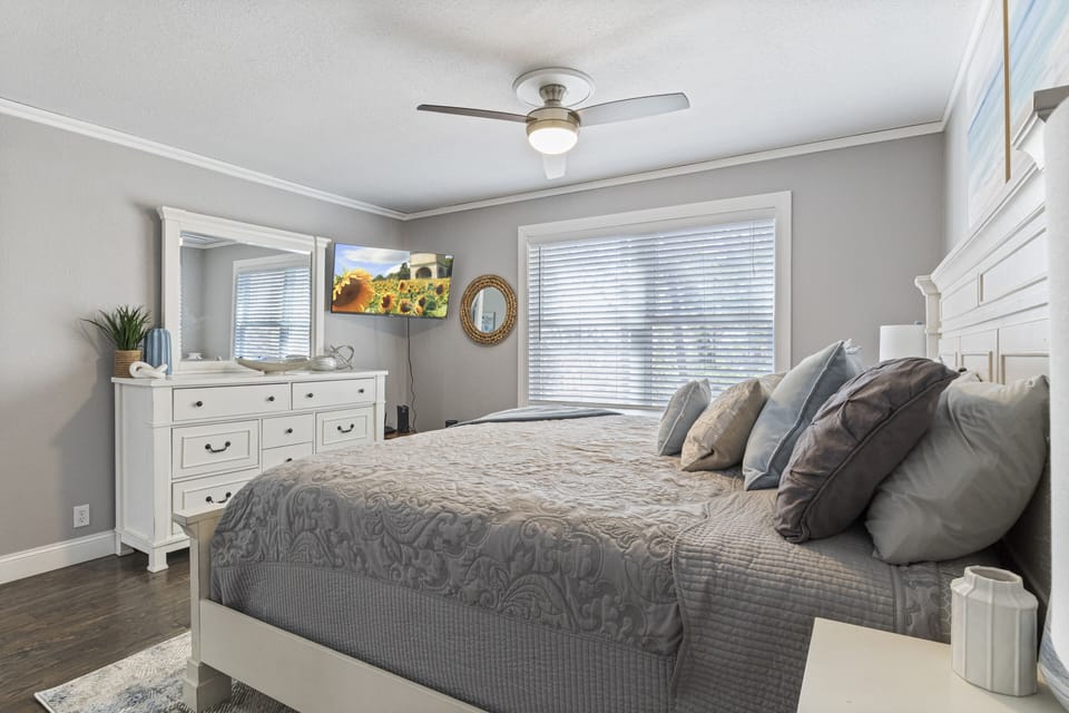 Large windows letting in natural light and a cozy ambiance for restful nights.