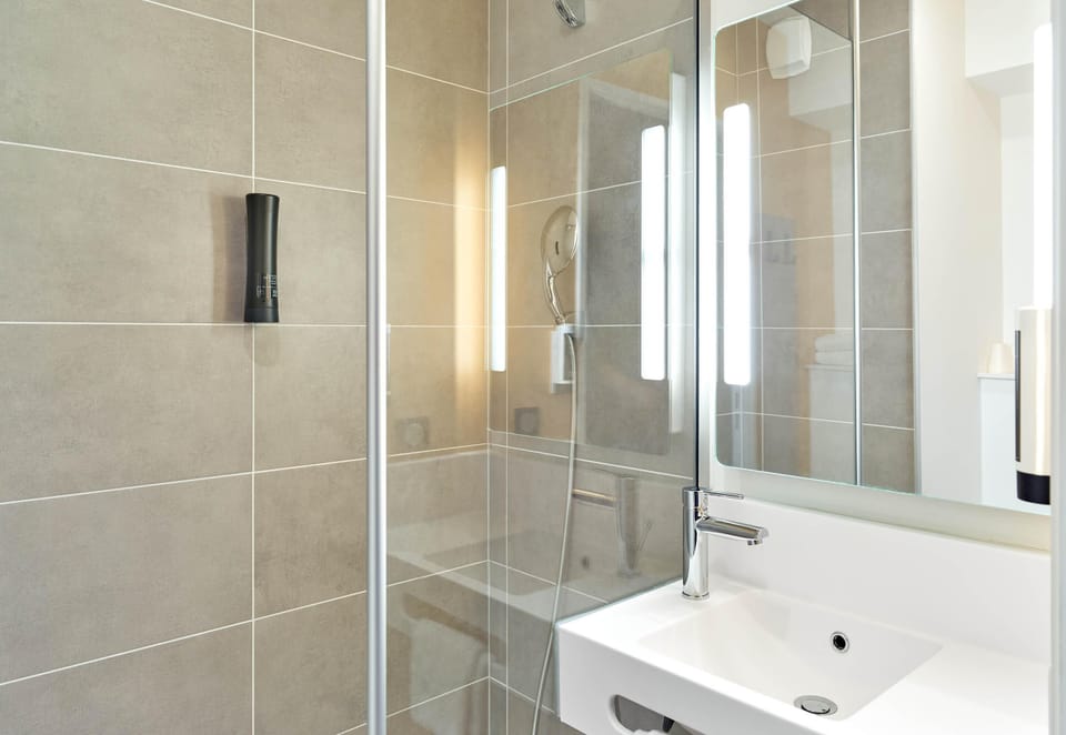 Shower, towels, soap, toilet paper