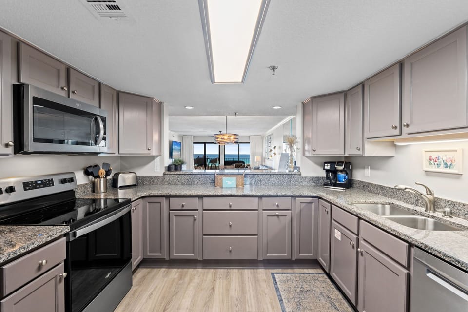 Kitchen - Stocked with stainless steel appliances.