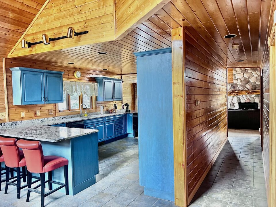 Hallway leads to bathroom and main floor bedroom