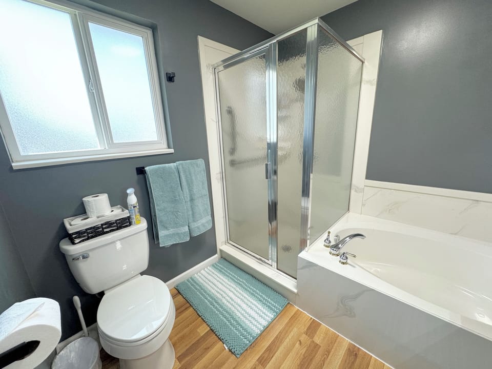 Master bath with bath tub & shower
