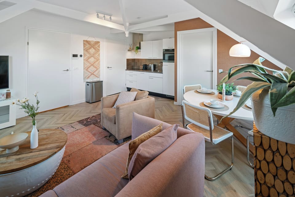 Bright and airy living room to relax after exploring — the perfect spot for Overnachten Roosendaal.