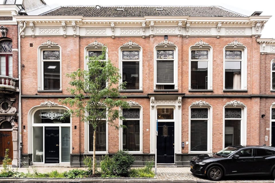 Beautiful exterior of a classic building, showcasing charming architecture in a prime location
