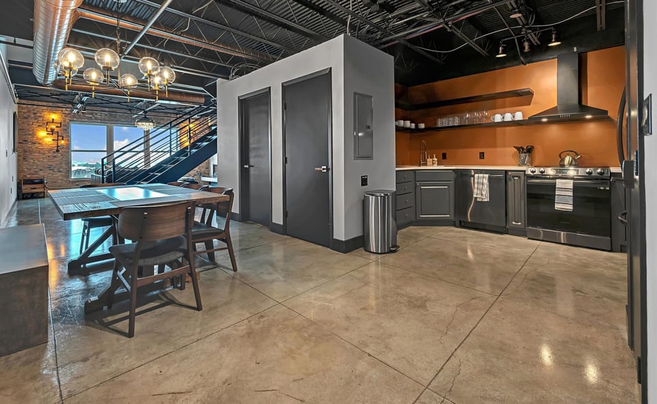 Embrace effortless entertaining in this open-concept kitchen and dining space, where culinary creativity and shared meals come together in perfect harmony.