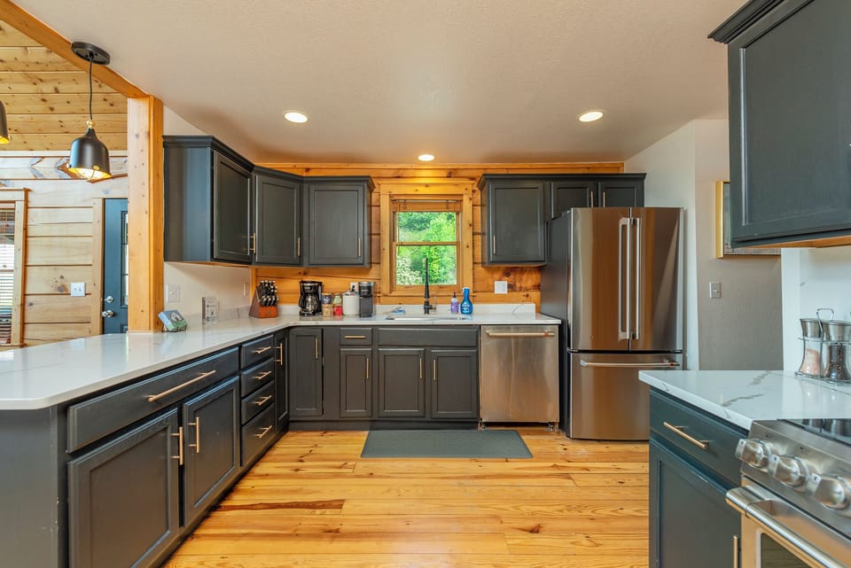 Remodeled Kitchen with Cafe Appliances & Refinished Floors