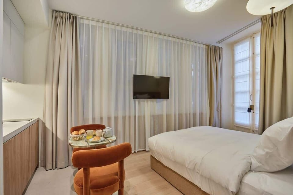 Chambre TV WIFI / Espace Repas