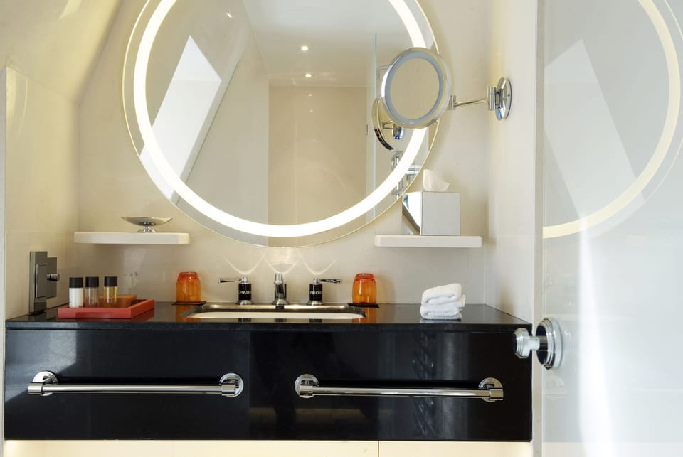 Separate tub and shower, rainfall showerhead, free toiletries