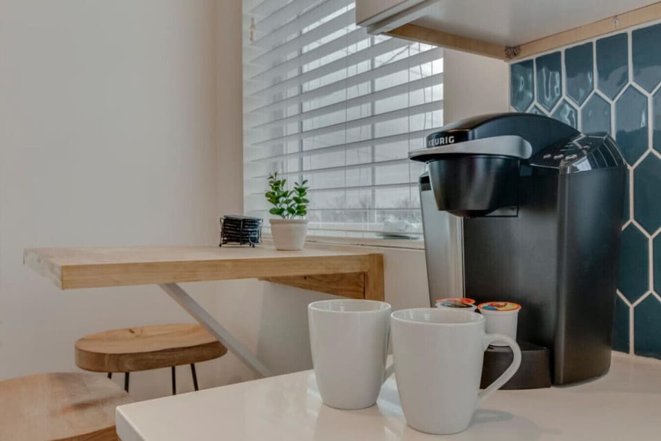 A Keurig coffee station tucked into the kitchen is a thoughtful touch for morning routines.