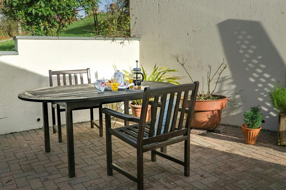 Patio area with table and two chairs