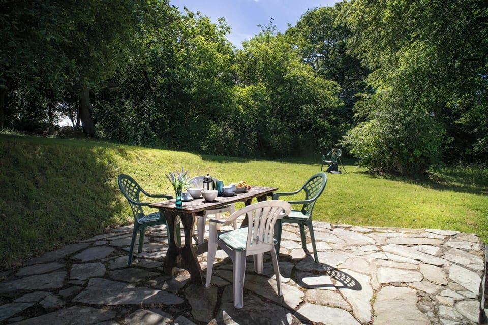 Table and chairs outside of Garden Cottage