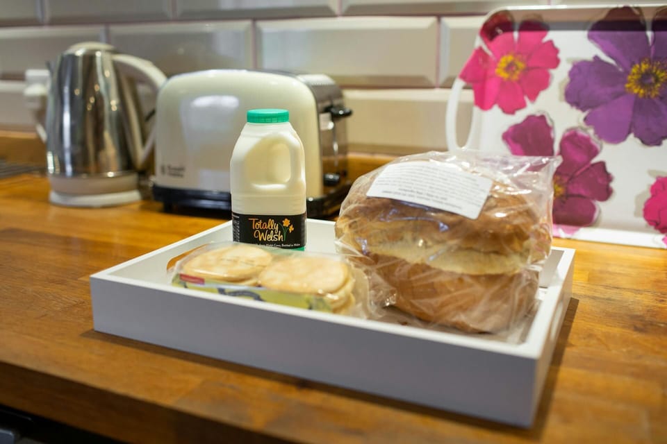 Welcome pack of Welsh Cakes, milk and bread