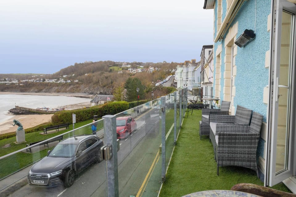 Balcony with sea and beach views