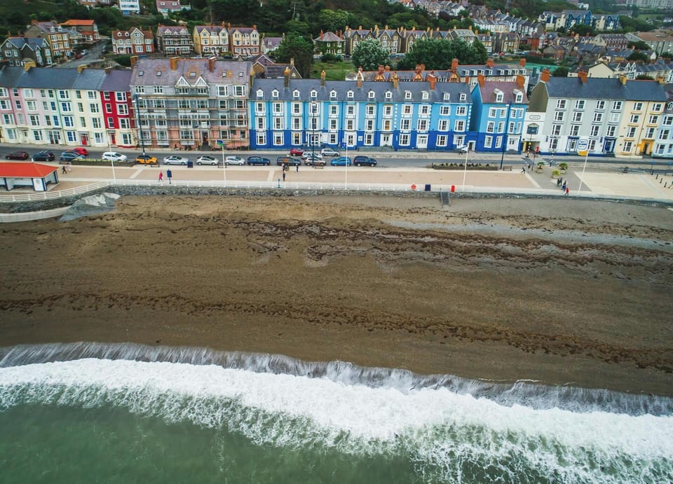 Ariel view of the coloured houses along the shore line