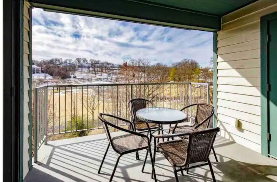 Covered patio with golf course view
