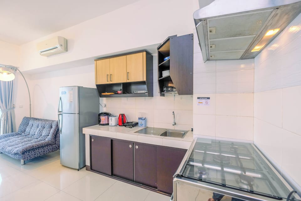 Apartment | Private kitchen | Fridge, stovetop, rice cooker, dining tables