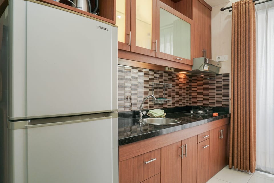 Apartment | Private kitchen | Fridge, stovetop, electric kettle, rice cooker
