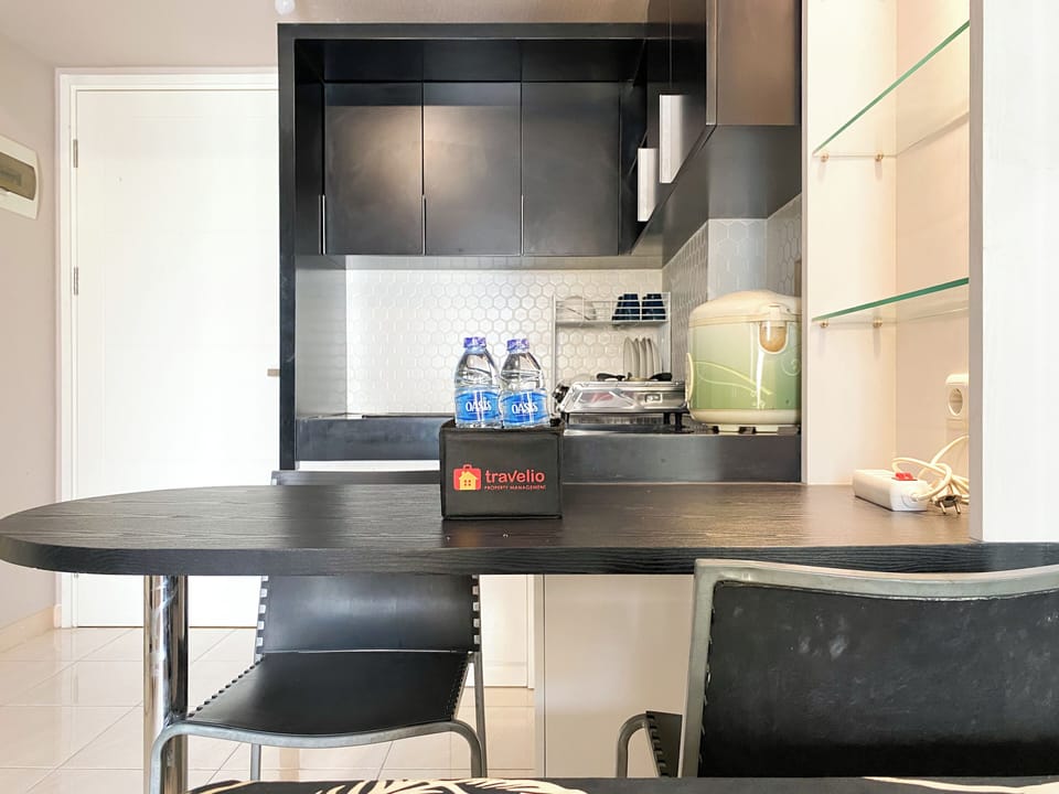 Apartment | Private kitchen | Full-size fridge, stovetop, electric kettle, cookware/dishes/utensils