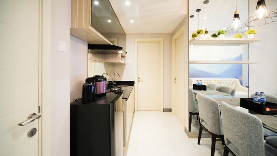 Apartment | Private kitchen | Full-size fridge, stovetop, electric kettle, cookware/dishes/utensils