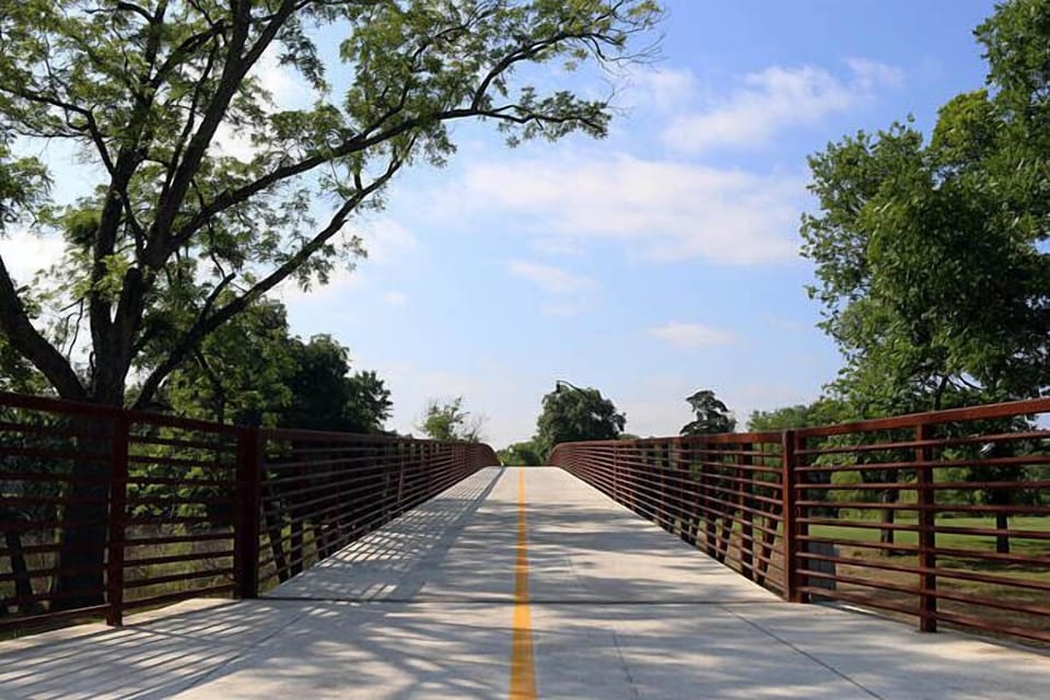 The Moments in Time Hike & Bike Trail is an eight-foot wide concrete trail traversing 2.93 miles from the Granbury Airport to Hewlett Park. Only 13 minutes away! 