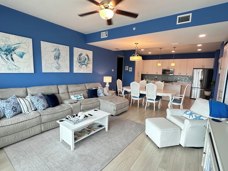 Reclining sectional, plenty of seating, open concept, modern living space