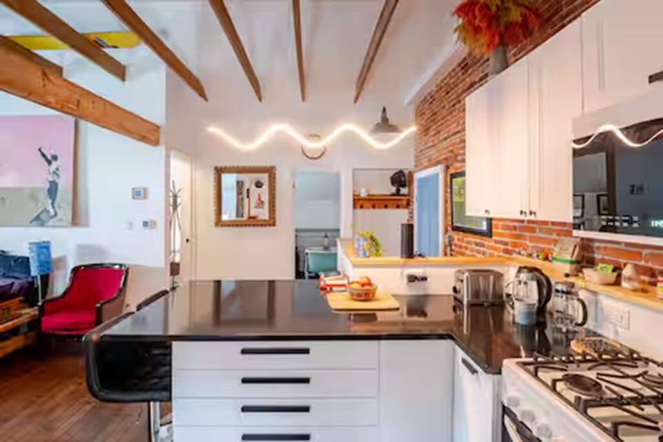 Coffee, tea, sugar, half/half and some fresh fruit are ready for your morning