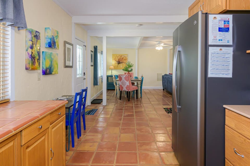 Just off the kitchen is the 1st bedroom, laundry room and half bath!