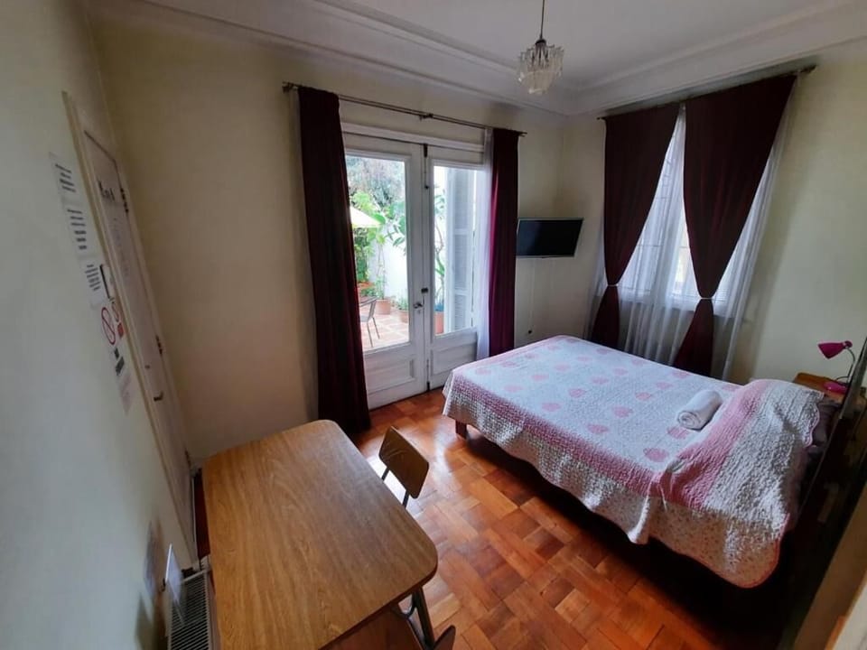 Premium bedding, desk, laptop workspace, soundproofing