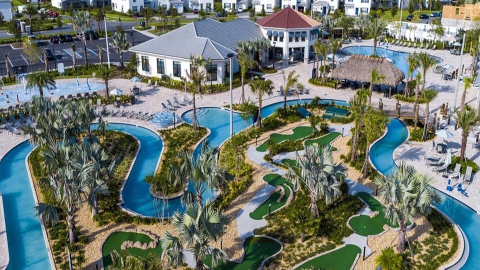 Indulge in ultimate relaxation as you float in the sun-kissed waters of the resort lazy river, offering a serene retreat just steps from your door.