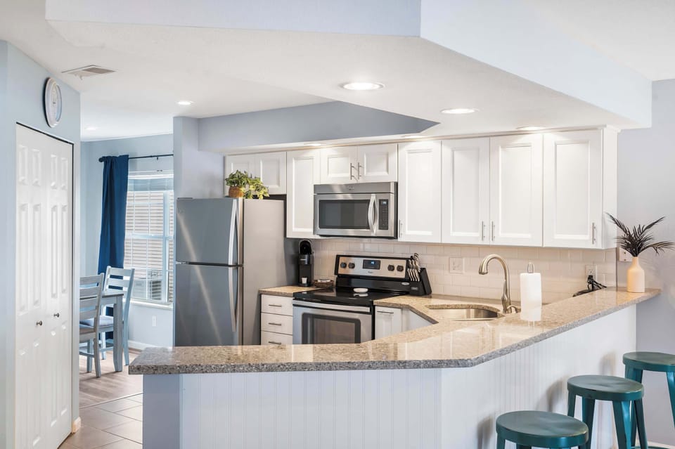 Condo, Multiple Beds, Fireplace, Garden View (Brookside Haven) | Private kitchen | Coffee/tea maker